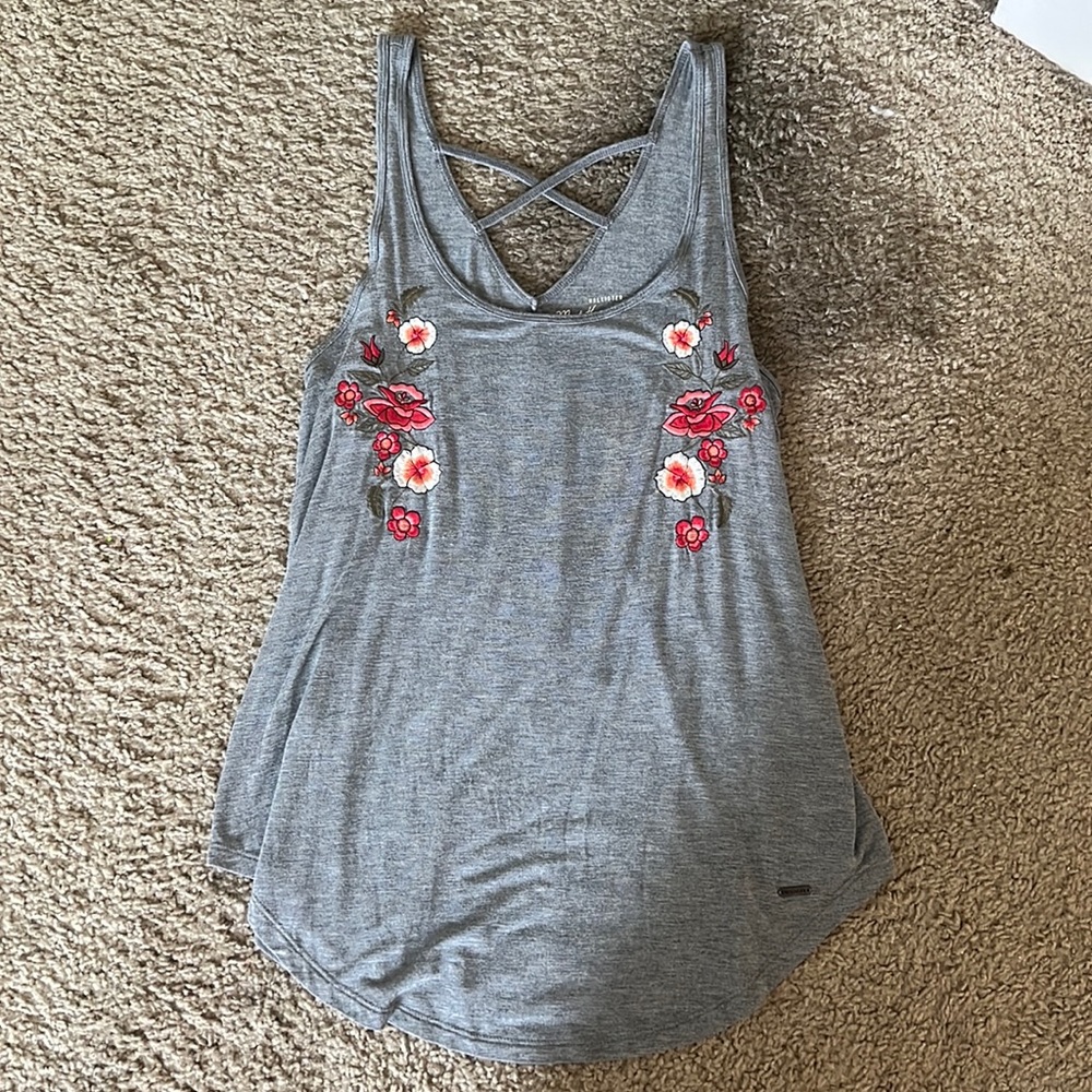Grey tank top with floral designs